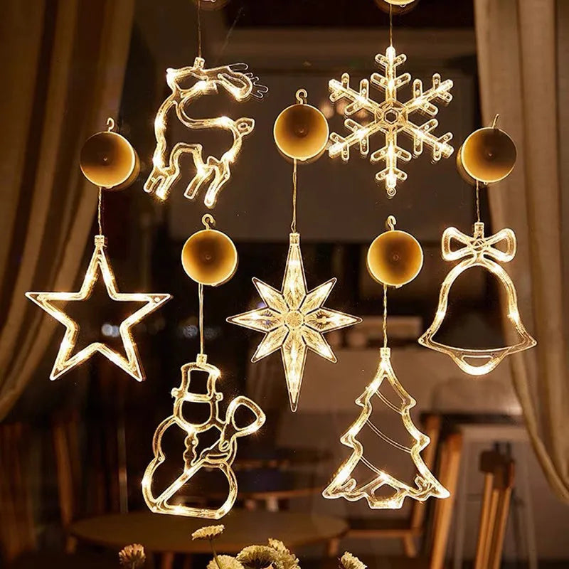 Battery-powered LED Christmas chandelier with suction cups, showing Santa Claus and snowman shapes