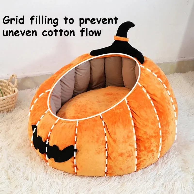 Orange Halloween pumpkin-shaped soft plush cat bed with a cartoon devil face design.