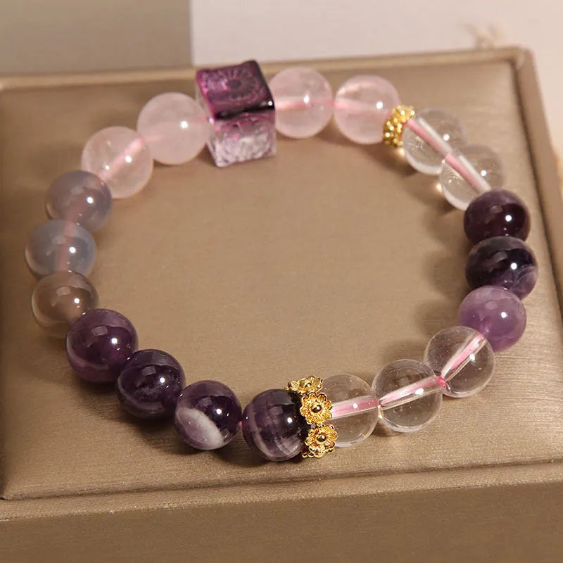 Close-up of a women's purple crystal amethyst bracelet with rhinestones, showing its 10mm size.