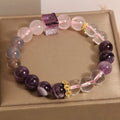 Close-up of a women's purple crystal amethyst bracelet with rhinestones, showing its 10mm size.
