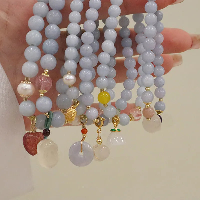 Women's aquamarine artificial crystal bracelet with gold-plated chalcedony pendant in floral design