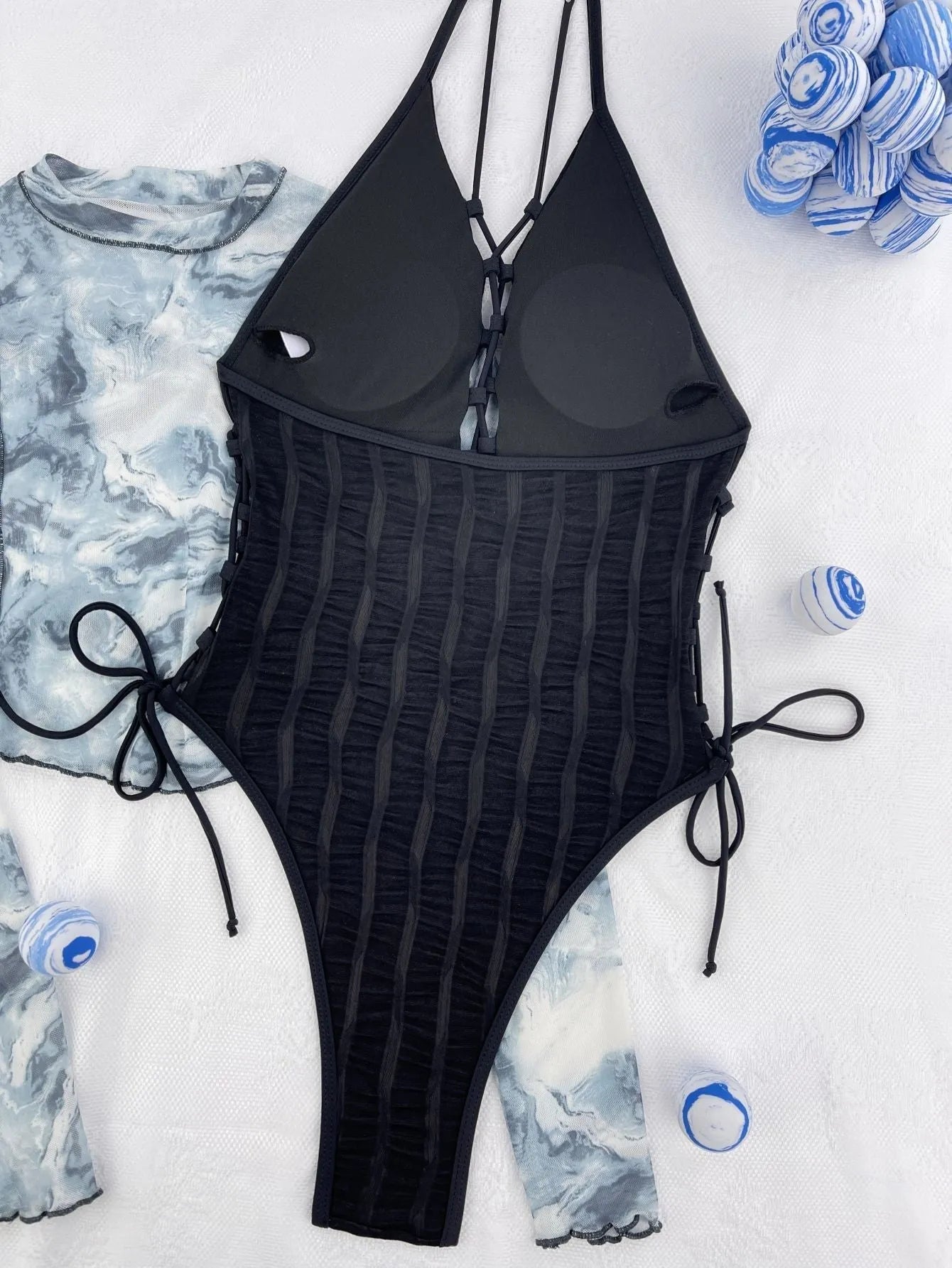 Black solid colour one-piece swimsuit for women with polyester construction in S M L sizes