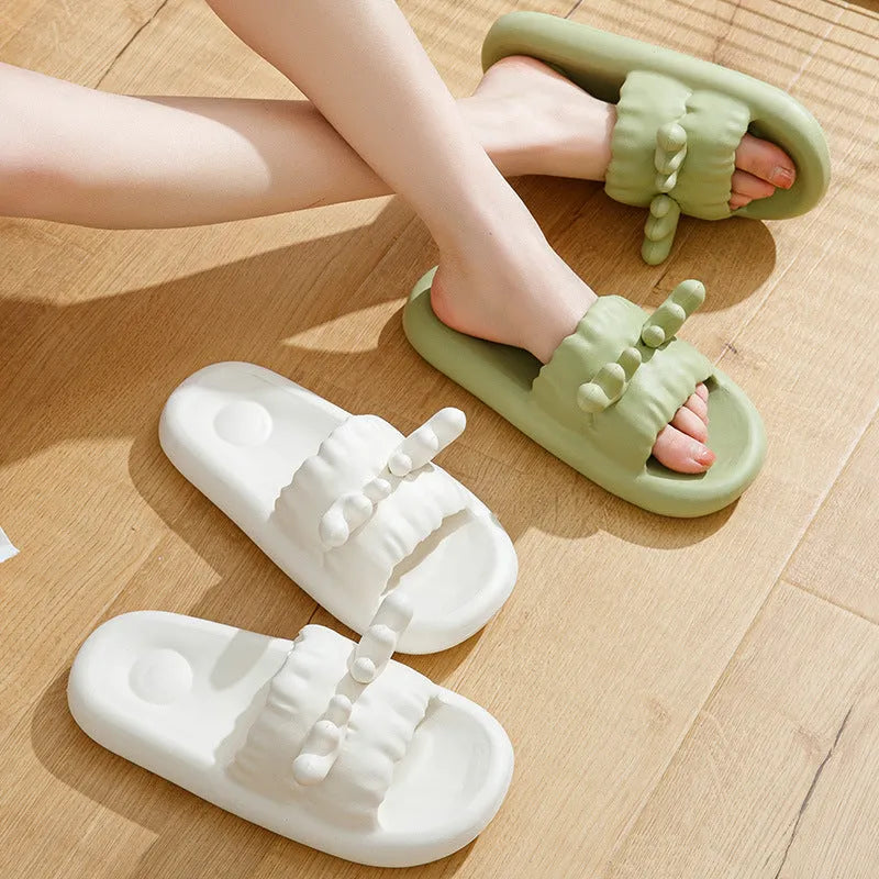 Women's EVA flip flop slippers with deer horn design and non-slip sole in light yellow.