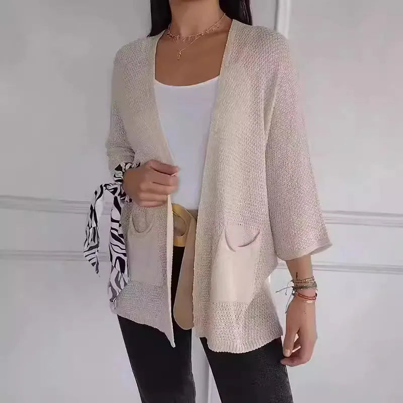 Women's waffle-textured cardigan coat with nine-quarter length sleeves in Army Green.