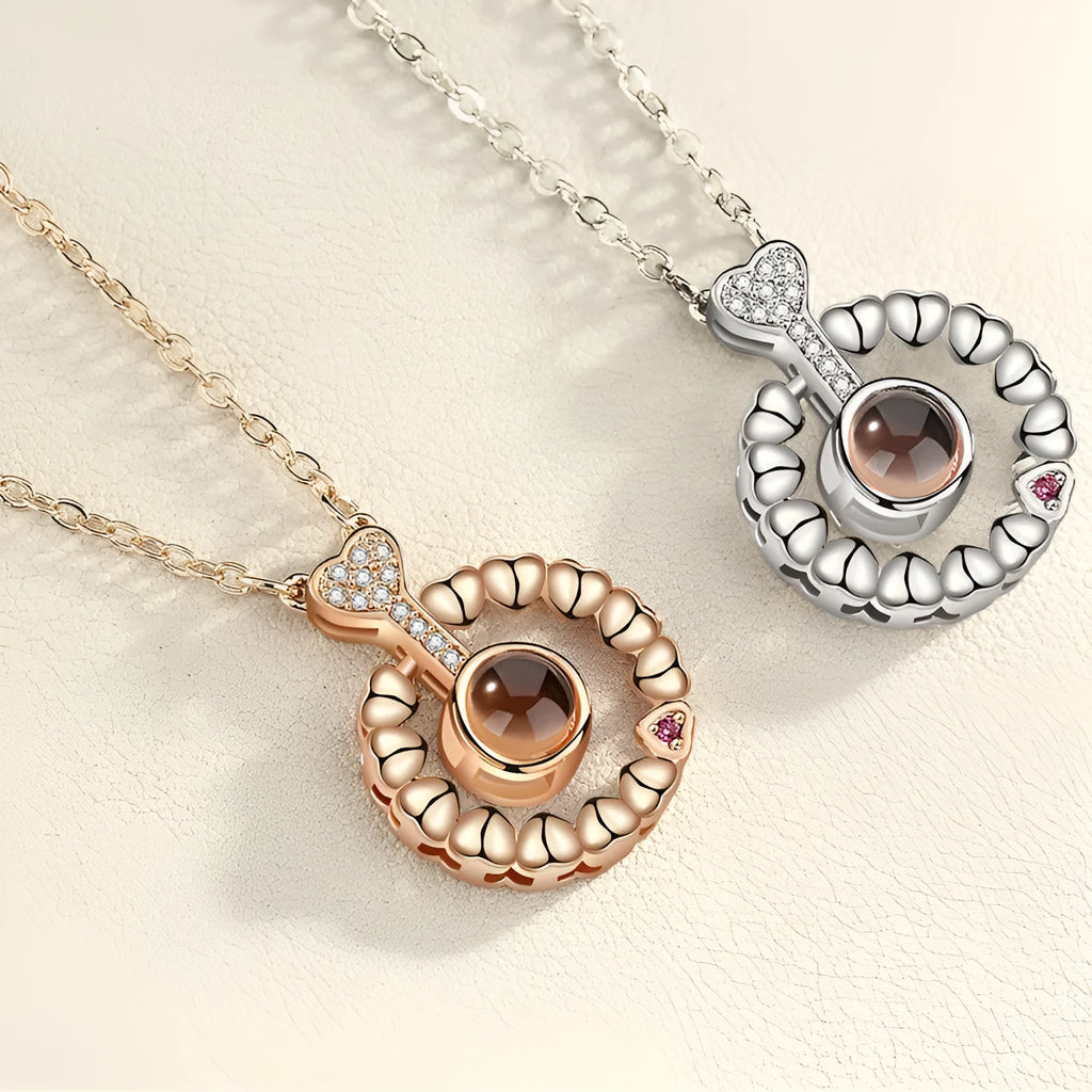 I love you 100 languages projection necklace, copper with gold plating, 50cm chain, pendant detail