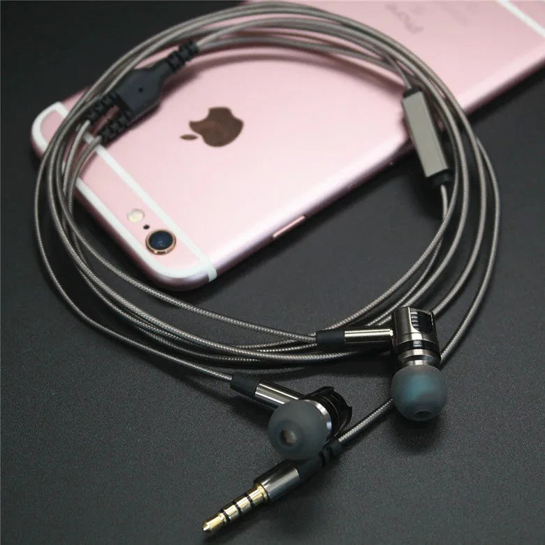 Titanium grey metal in-ear earphones with a detachable TPE cable and aluminium foil shielding.