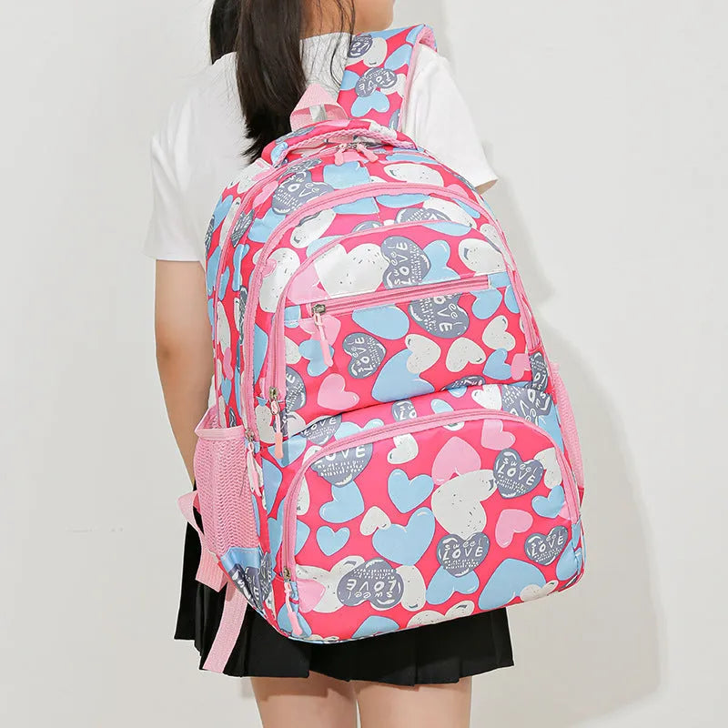 Blue children's large capacity Oxford cloth school backpack with air pillow shoulder straps.