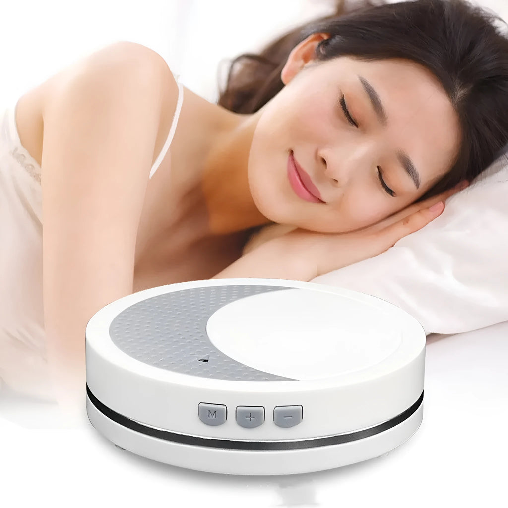 White ABS plastic sleep aid instrument with USB connector showing timer and music functions