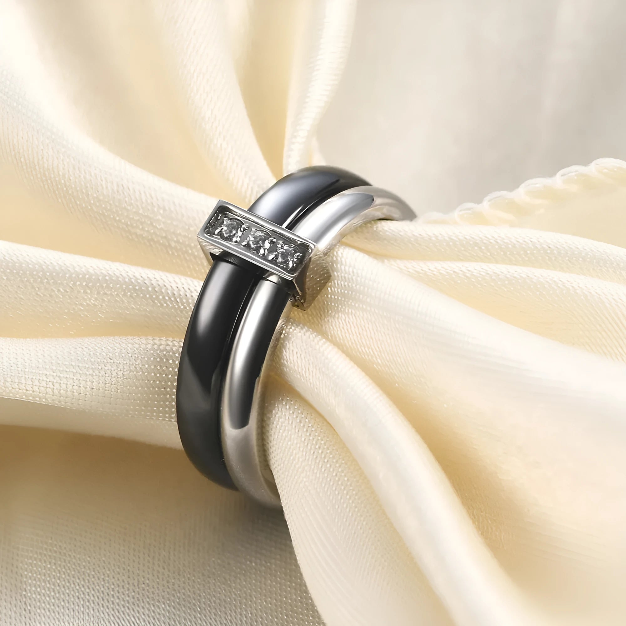 Glossy black ceramic women's ring with round zirconium stones on a geometric 6mm band.