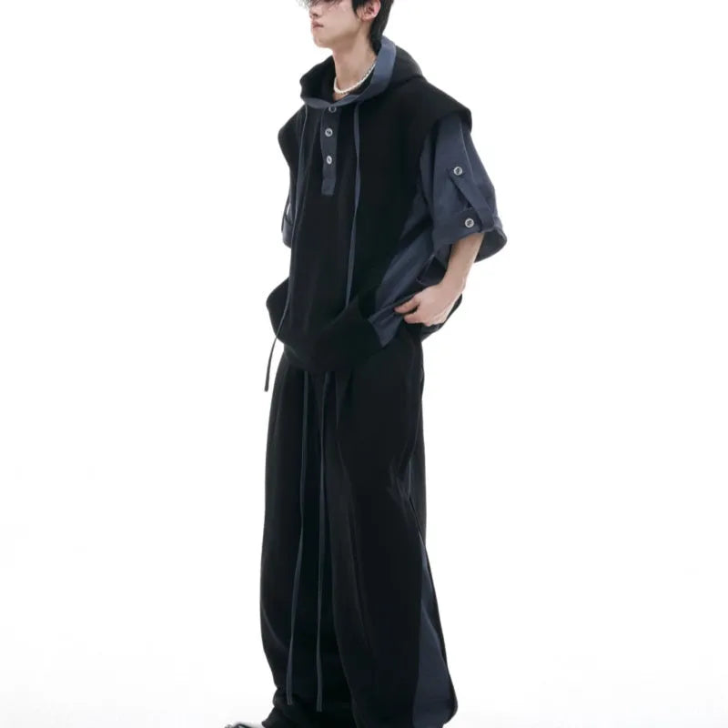 Men's grey hooded sports jacket and matching trousers with three-dimensional stitching detail.