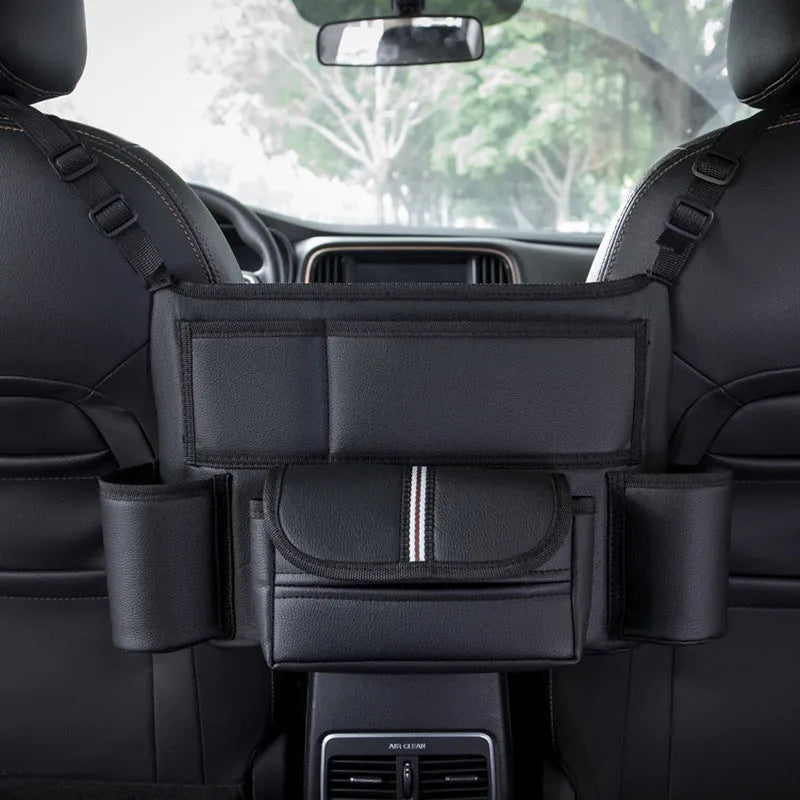 Black leather car seat storage bag with integrated hanging armrest tissue box between vehicle seats