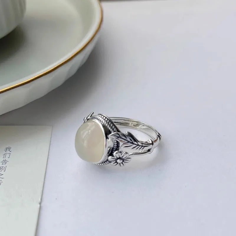 Adjustable copper vintage ring with white chalcedony gemstone and U-shaped band