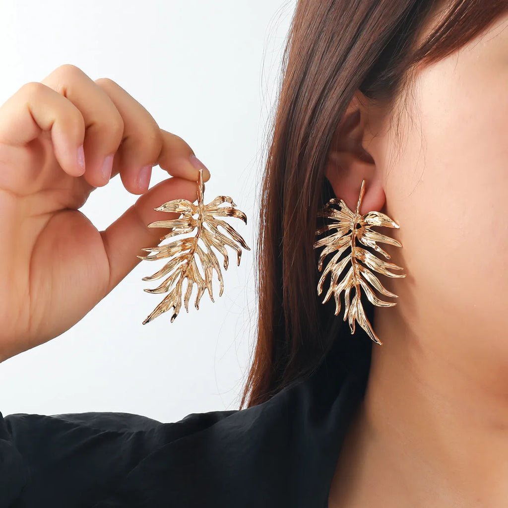 Gold and silver leaf-shaped geometric earrings for women made from zinc alloy affordable luxury style