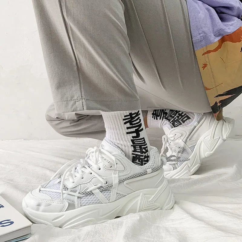 Men's white Korean-style platform dad shoes with lace-up front and thick sole.