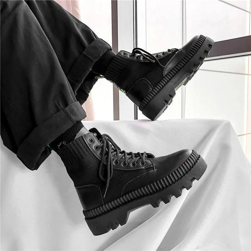 Black men's Dr. Martens platform boots with a side zipper and frosted leather upper.