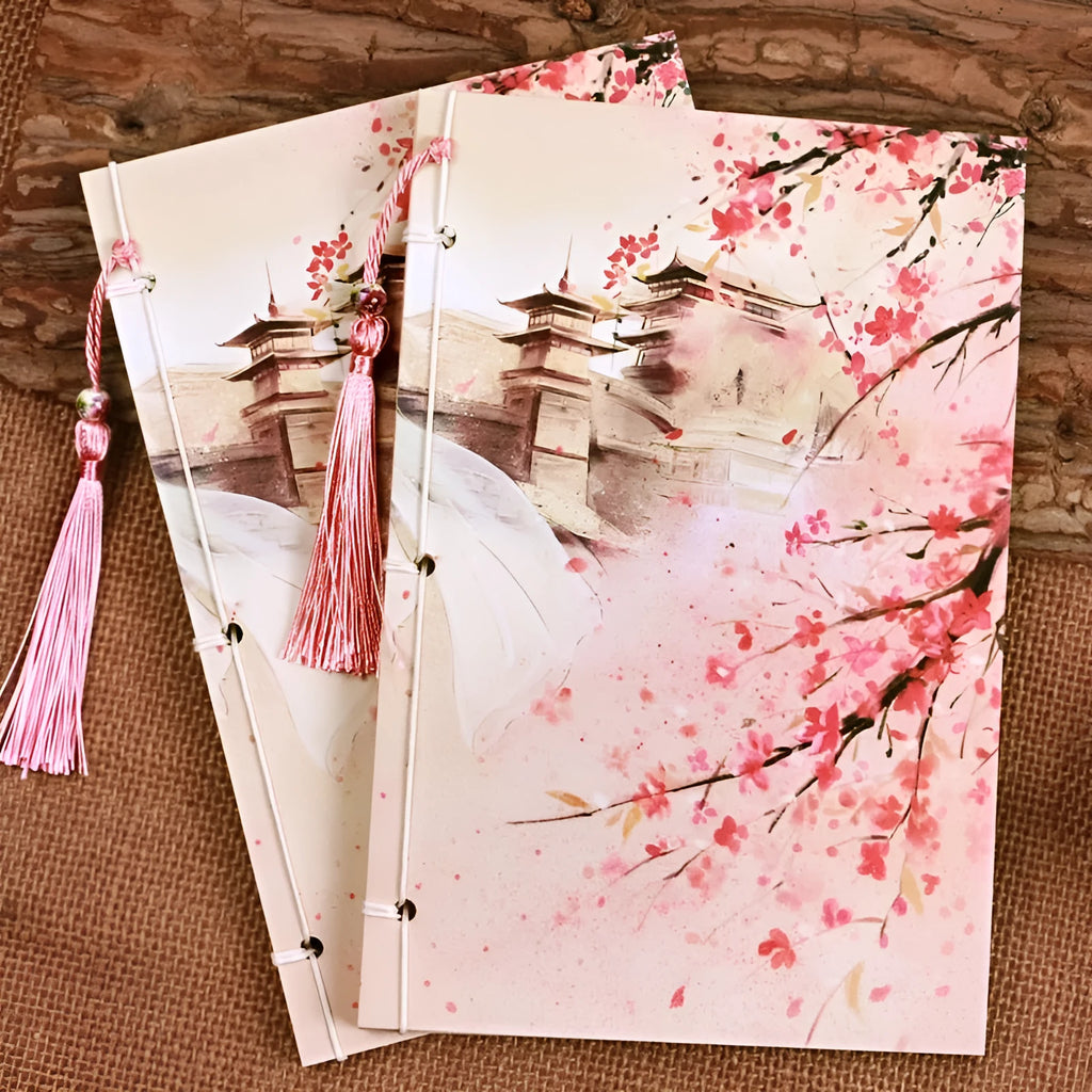 Chinese watercolour style thread-bound notebook in Azalea colour showing traditional binding and open pages
