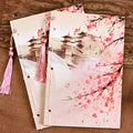 Chinese watercolour style thread-bound notebook in Azalea colour showing traditional binding and open pages