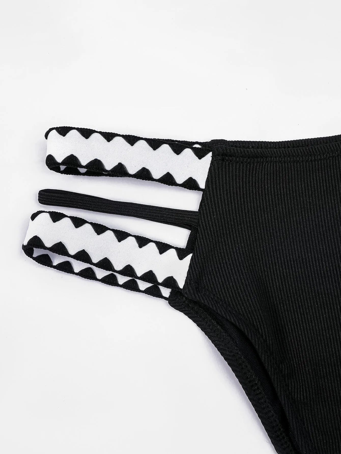 Black women's hollowed-out split swimsuit bikini with briefs styling for swimming