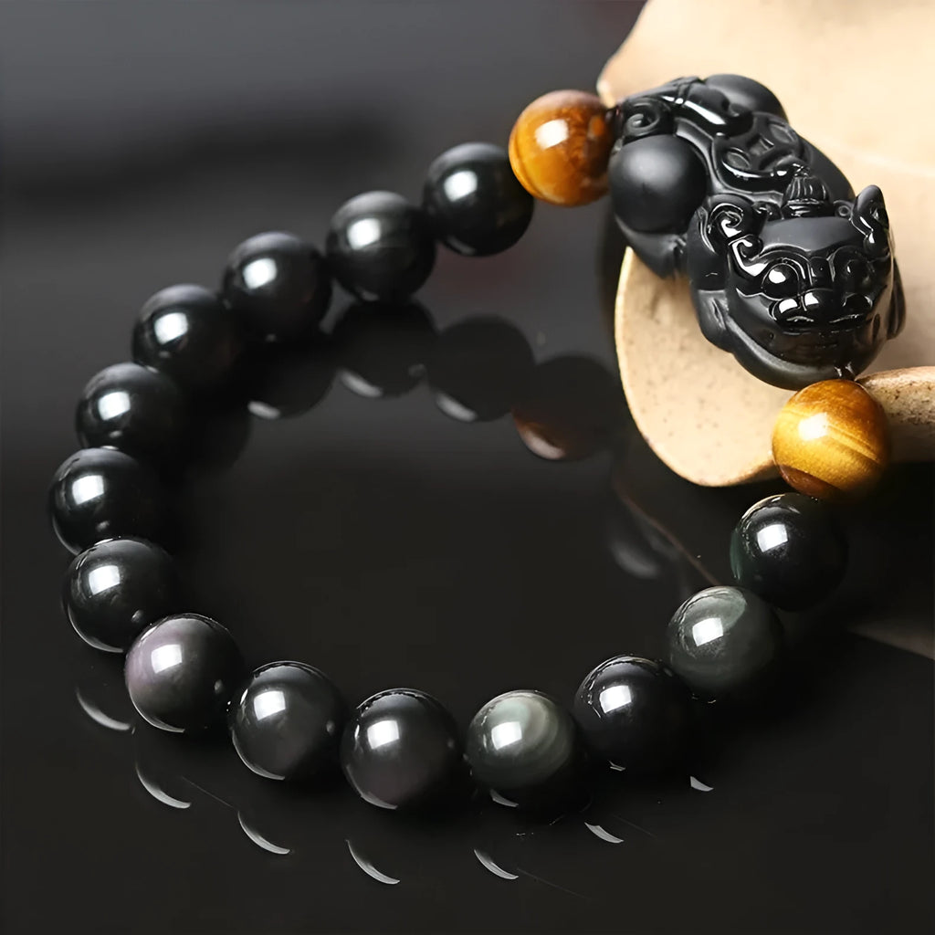Black obsidian bracelet with gold sheen finish and Pixiu charm in four size options