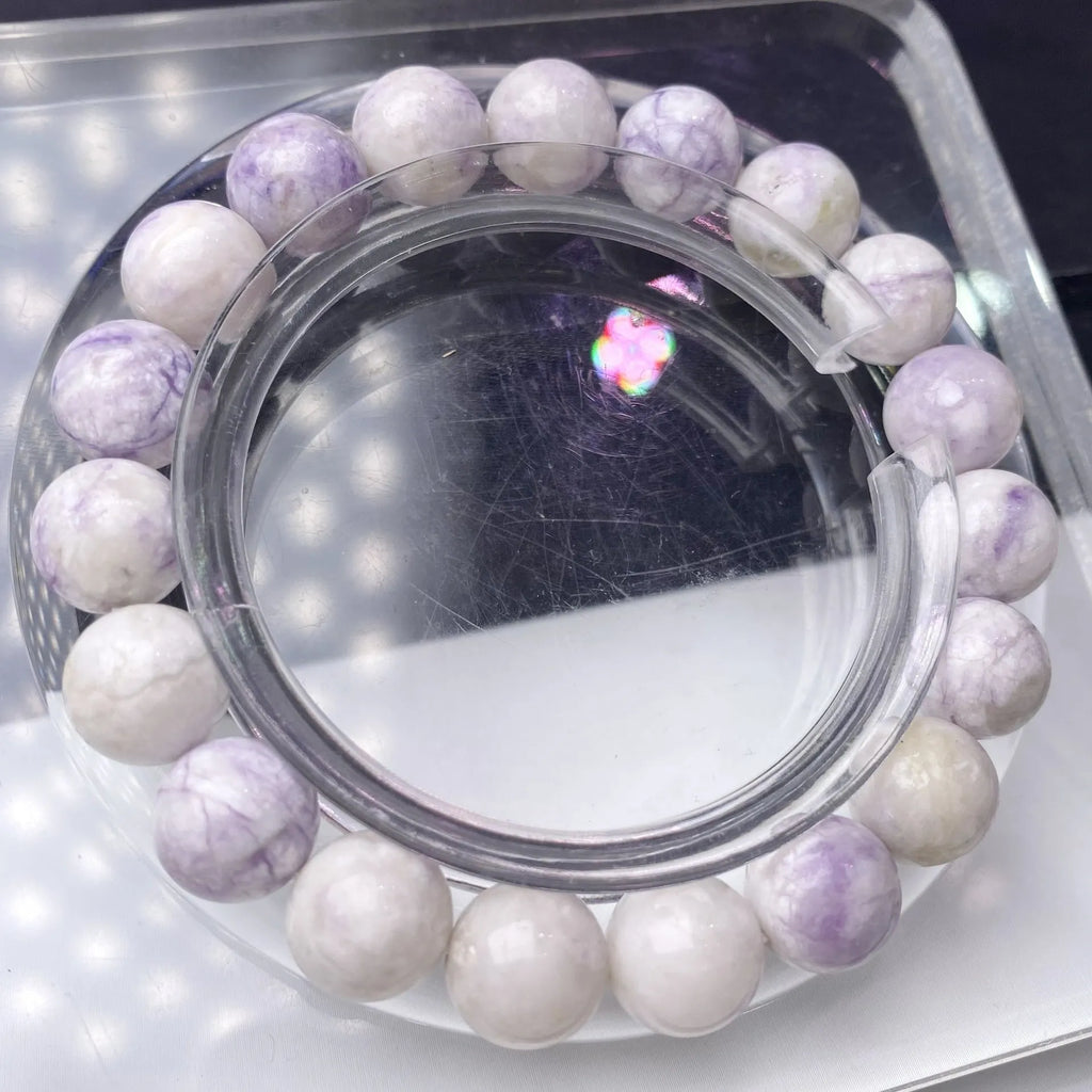 Natural purple turquoise beaded bracelet for women, showing stone colour variation.
