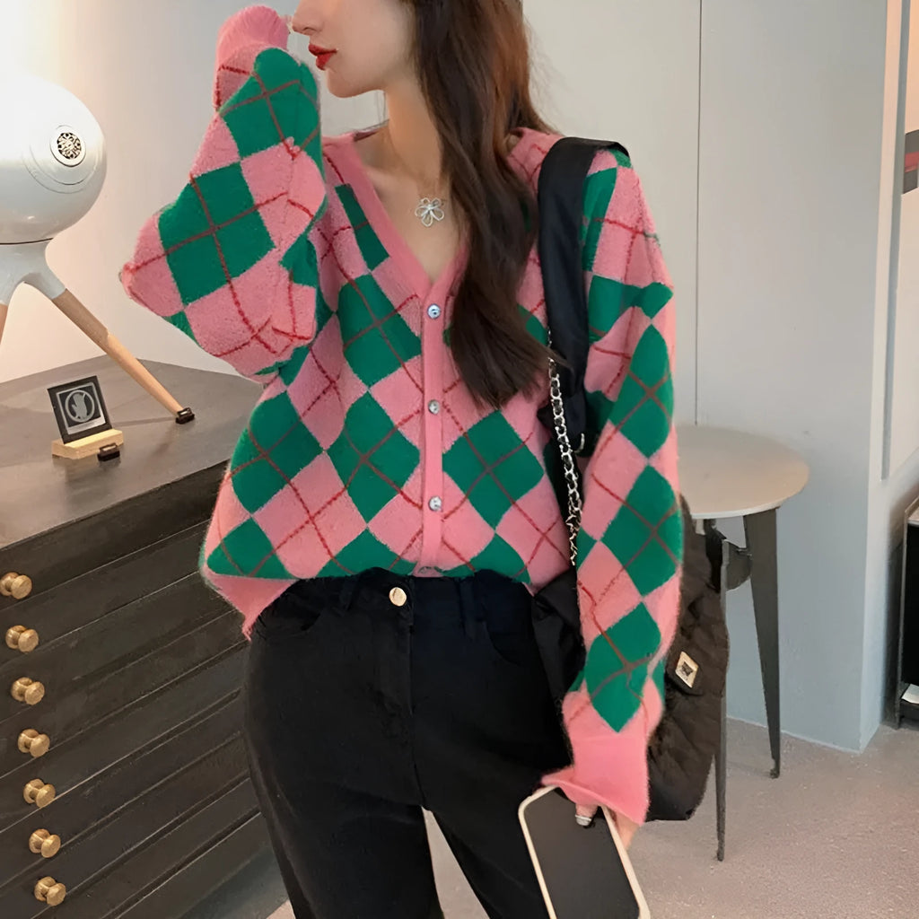 A casual knitted acrylic cardigan coat in a macaron colour, shown in a regular fit with regular sleeves.