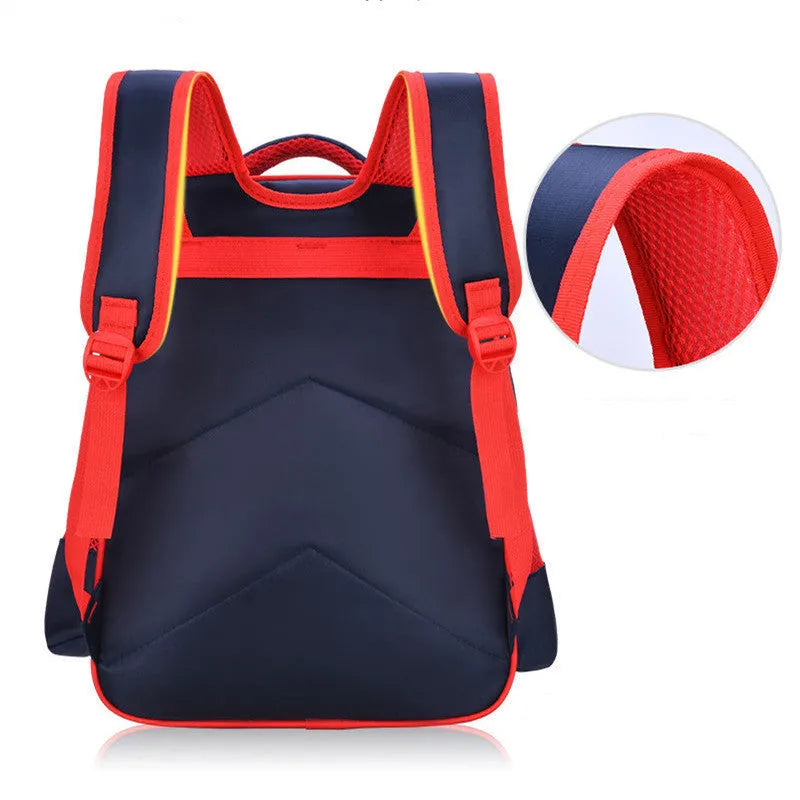 Blue children's school backpack with anime cartoon print, showing front pocket and shoulder straps.