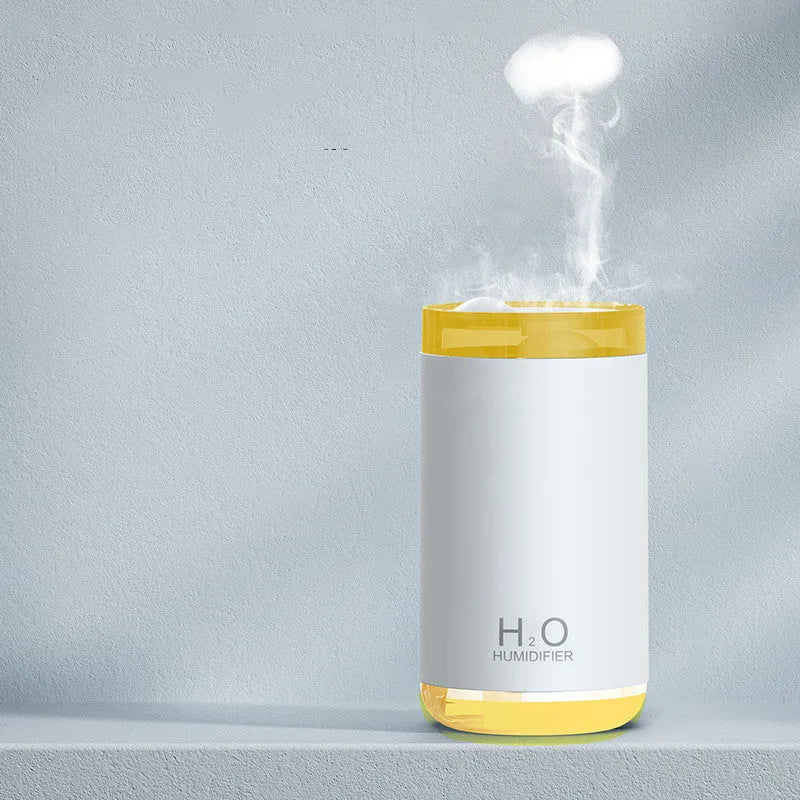 Jellyfish humidifier with warm night light showing smoke ring mist patterns
