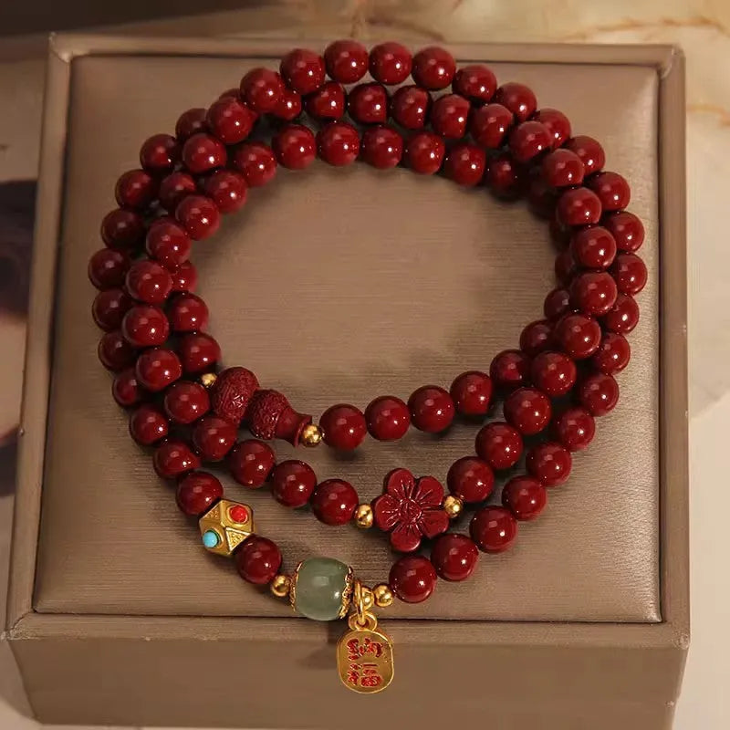 Red cinnabar bracelet with multi-circle gourd and five-petal flower geometric design