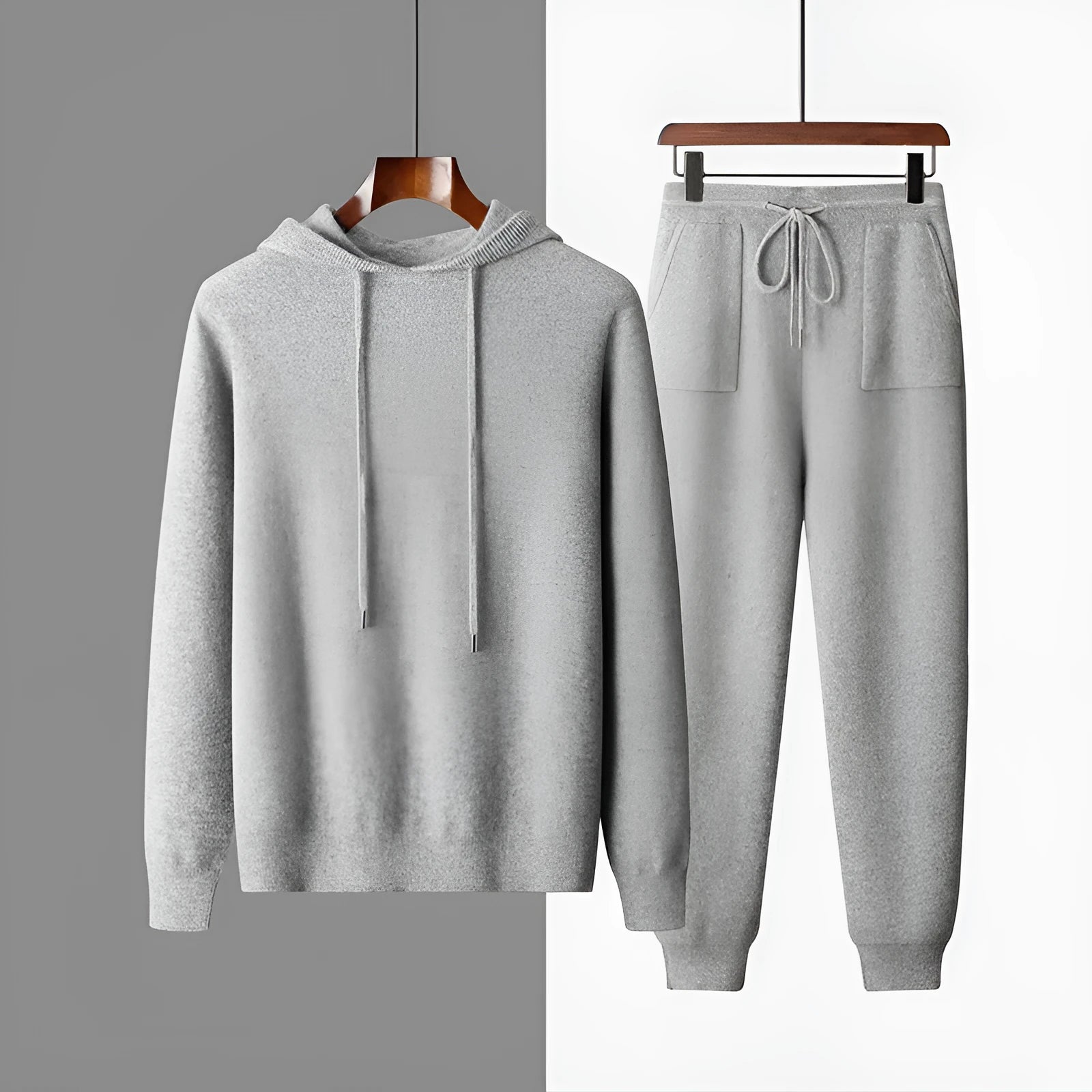 Men's light grey cashmere hooded sweatshirt and trousers leisure set on mannequin