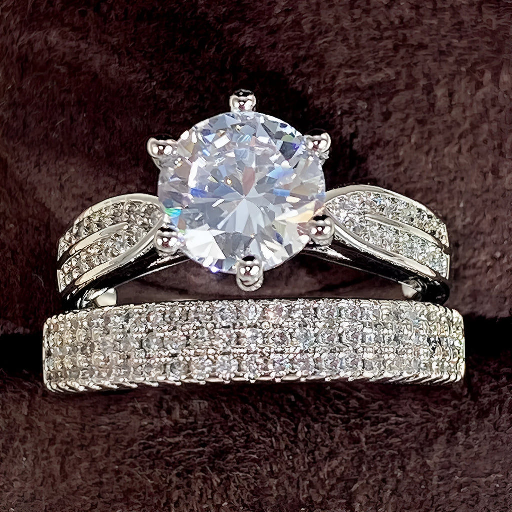 White gold colour alloy wedding bracelet combining a ring and simple bangle.
