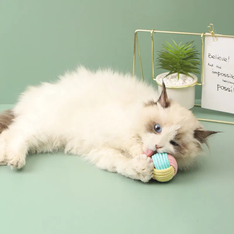 Handmade plush cotton cat hairball toy in blue pink colour for teeth grinding
