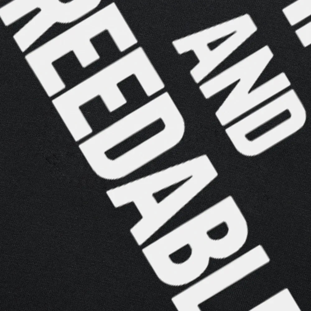 Loose fit cotton T-shirt with humorous printed design in black and white colour variations