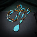 Turquoise water drop pendant necklace with ball bead chain and geometric designs