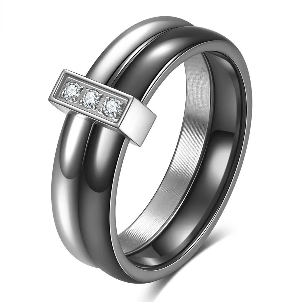 Glossy black ceramic women's ring with round zirconium stones on a geometric 6mm band.