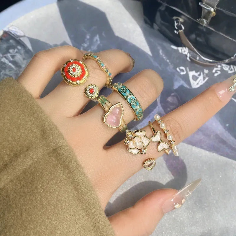 Vintage copper gourd ring with adjustable opening, oil dripping finish, and inlaid zircon stones