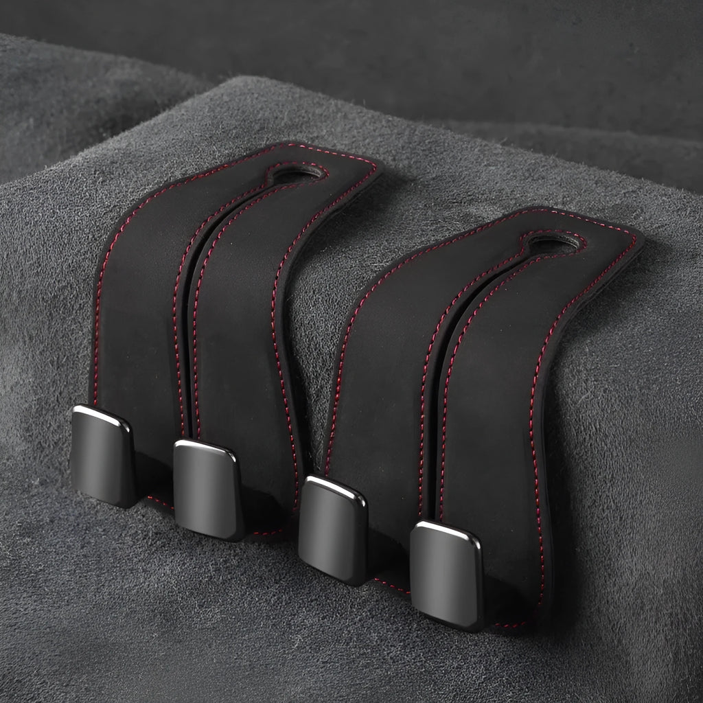 Alloy metal car seat gap storage hook with suede lining in black colour, shown flipped open.