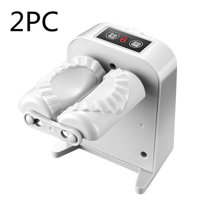 White electric automatic dumpling maker machine with accessories on a kitchen counter.