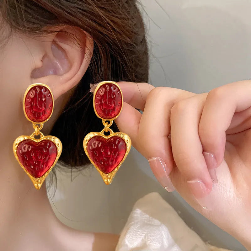 Pleated oval love heart stud earrings in alloy, showing purple, red, green, and yellow with white colour variations.