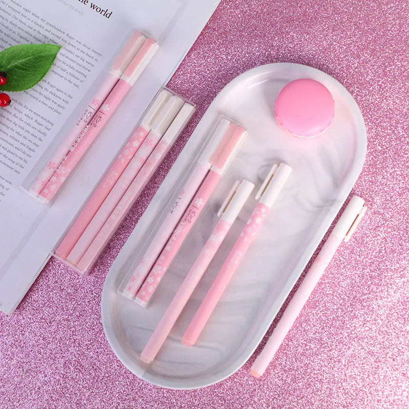 Sakura gel pen set showing plastic body pens with 0.38mm and 0.5mm tip options in boxed presentation