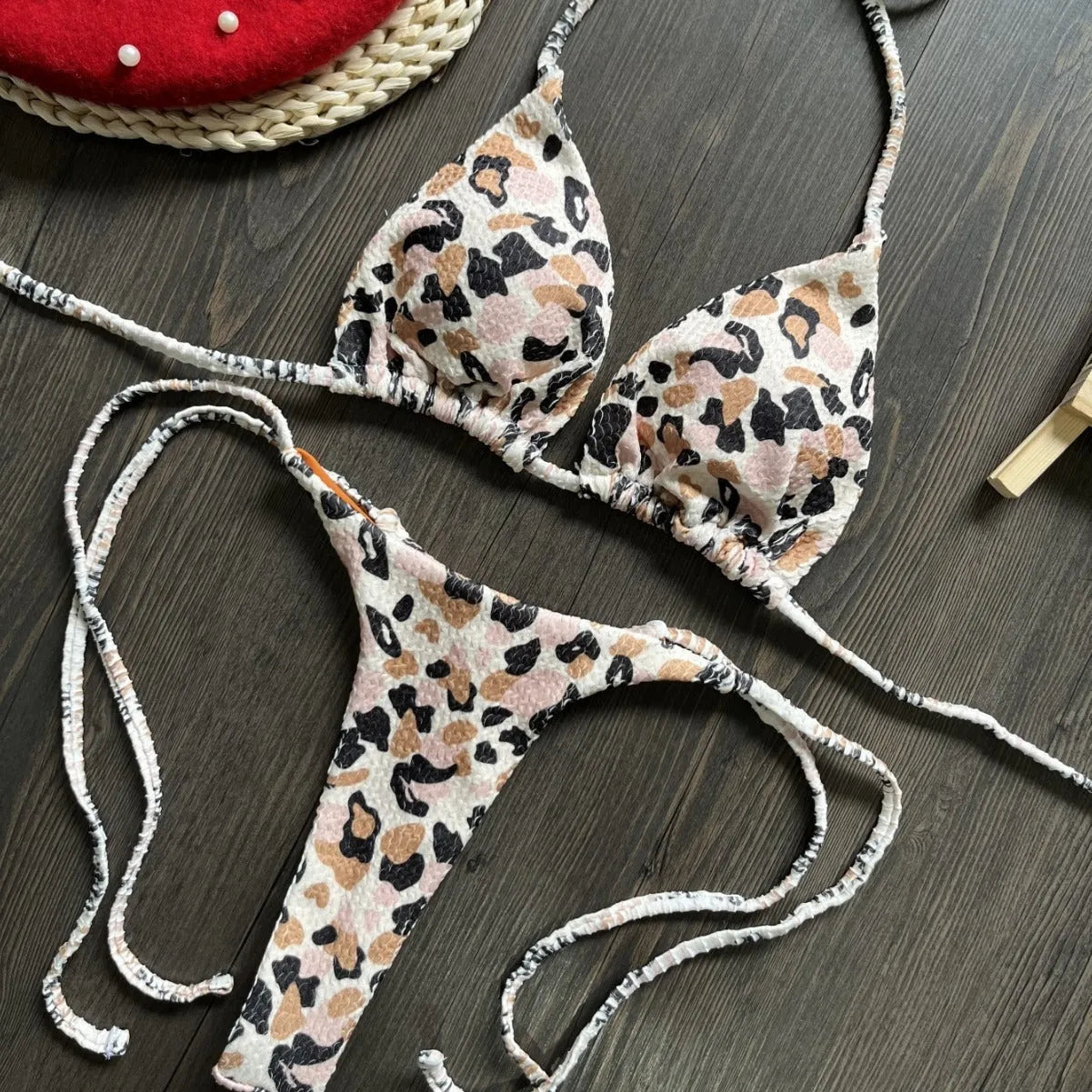 Women's printed bikini swimsuit with quick-dry fabric shown in available colours
