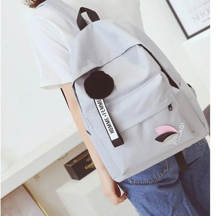 Casual canvas college-style schoolbag in leaf pattern design with anti-theft features