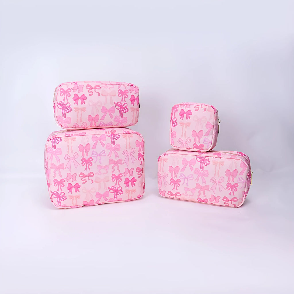 Printed nylon cosmetic bag in pink bow, pink stripes, blue or white with polyester lining and four sizes