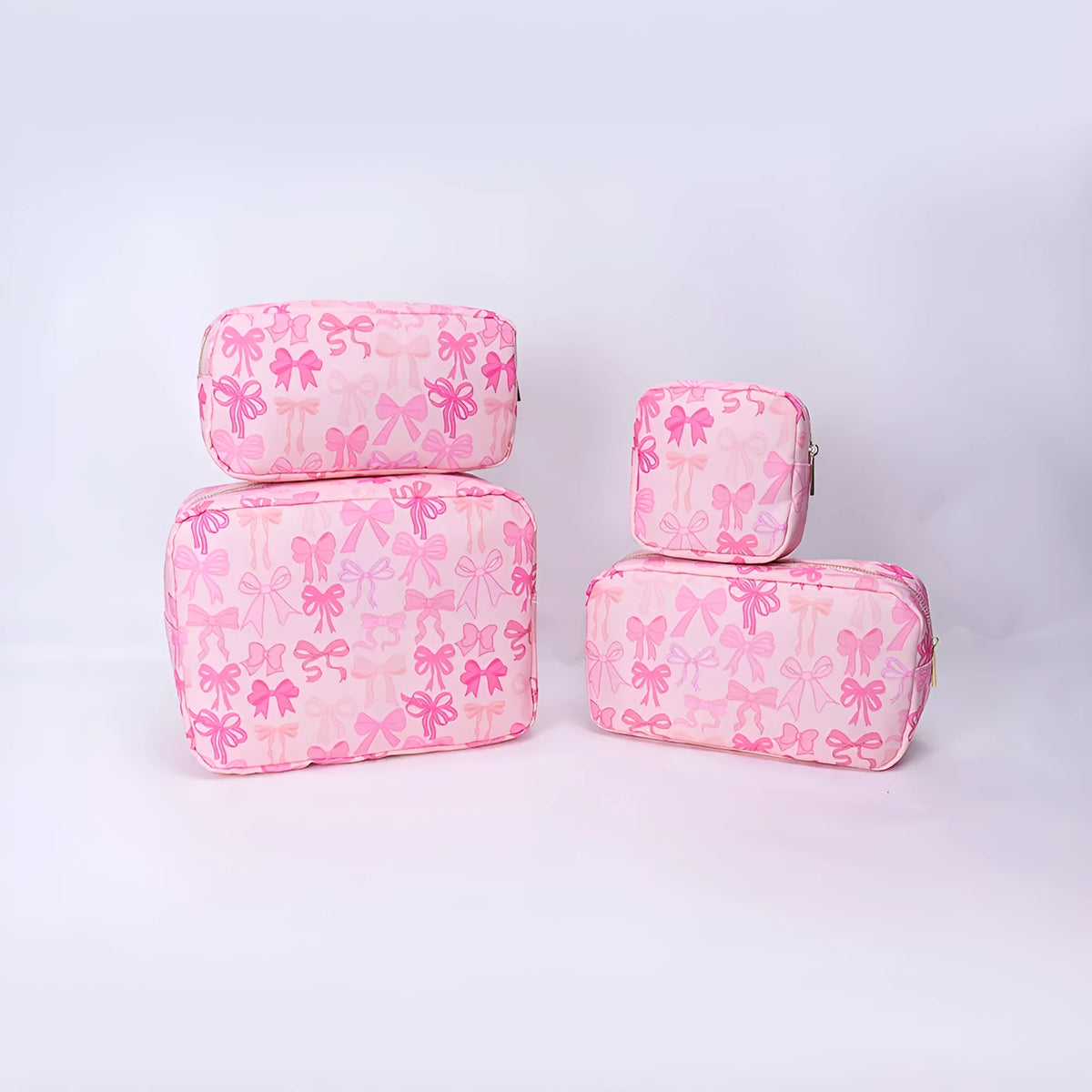 Printed nylon cosmetic bag in pink bow, pink stripes, blue or white with polyester lining and four sizes