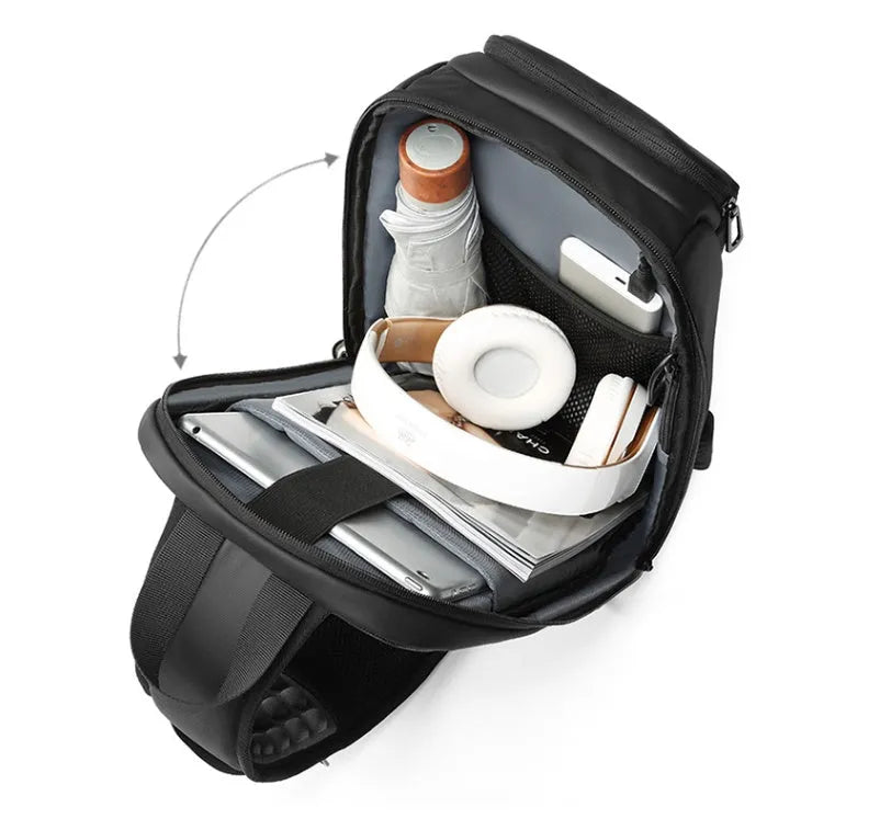 Black medium outdoor shoulder bag with air cushion strap and internal organisers