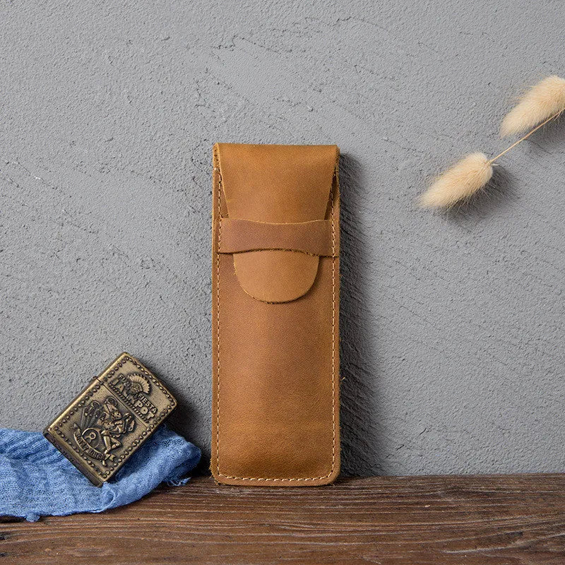 Vintage leather pencil case in square design showing black and brown colour options