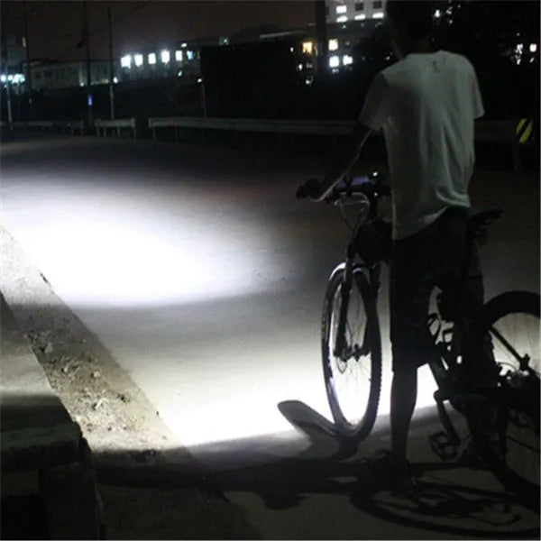 Black bicycle light with over-discharge protection for night cycling on a bike handlebar