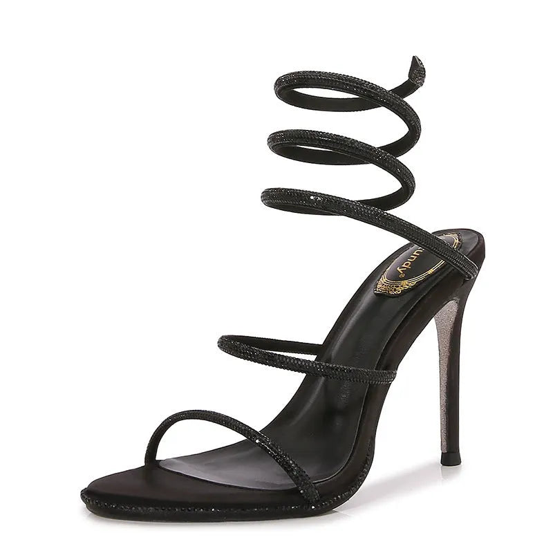 Women's rhinestone ankle-strap stiletto sandals with satin upper, round toe, and 10cm heel in silver colour