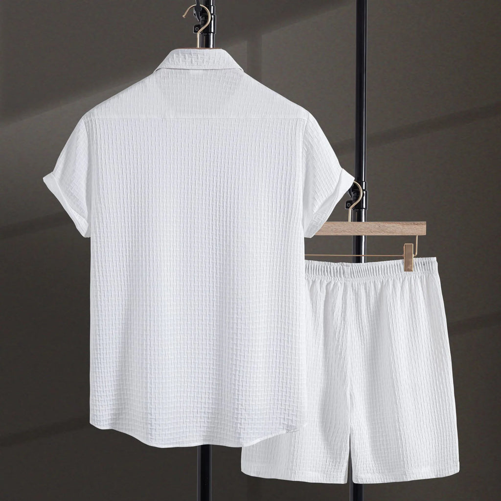 Men's black cotton blend short sleeve shirt and shorts casual suit set on a white background.