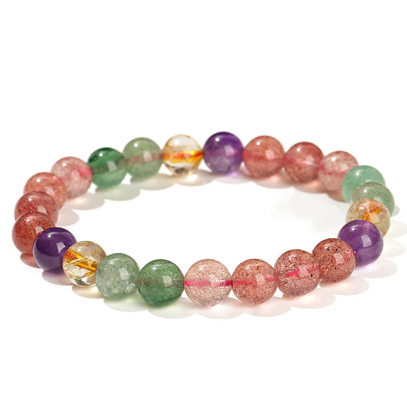 Women's strawberry quartz gemstone bracelet with round beads in a geometric pattern.