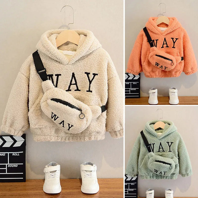 A child's beige fleece jacket with a cartoon pattern, featuring a hood and long sleeves.